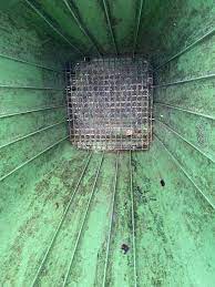 Commercial Dumpster Pad Before Cleaning